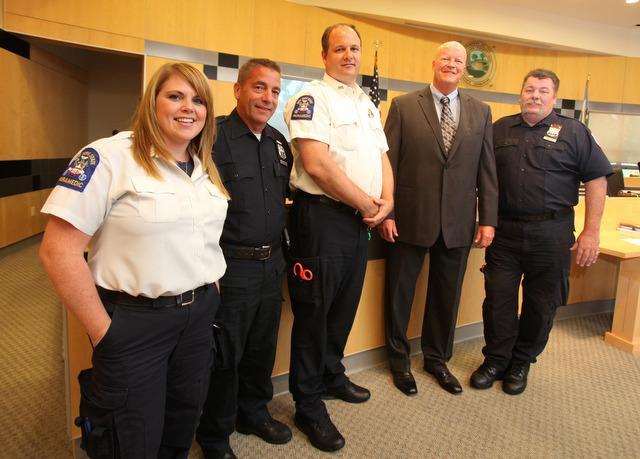 Erich Rechenberger and John Reilly of the Nanuet Ambulance Corps meet before a meeting of the County Legislature in New City. Jackson and the legislature commended the group for their efforts to help a woman deliver a baby at her home. Photo: Journal News (August 2, 2011)